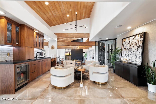 living room featuring vaulted ceiling, wood ceiling, beverage cooler, and a notable chandelier