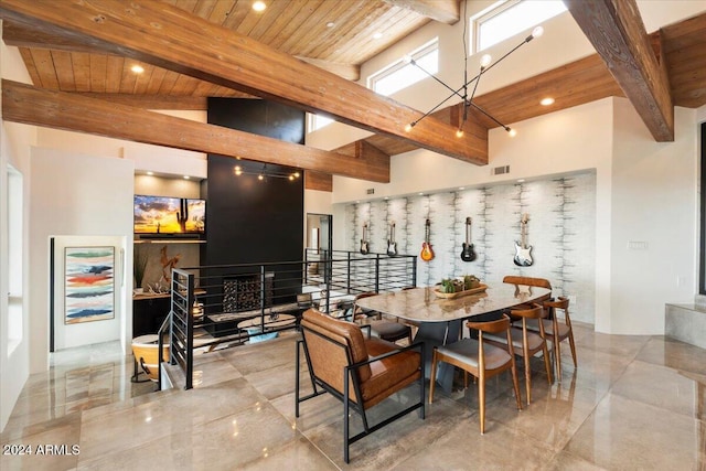 dining area featuring wood ceiling, a towering ceiling, and beamed ceiling