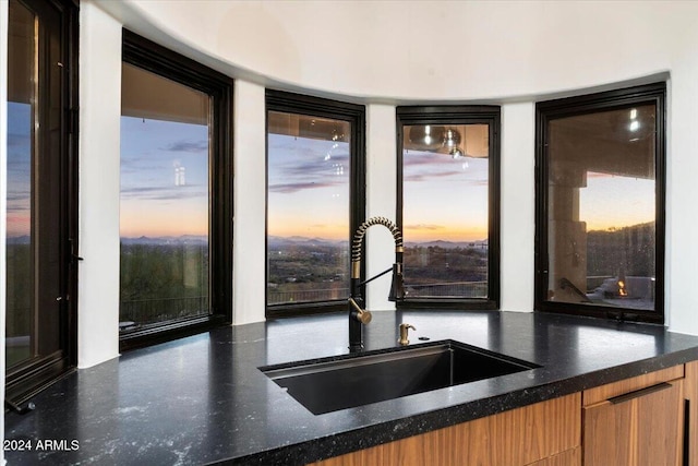 kitchen with plenty of natural light and sink