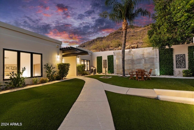 view of front of home featuring a yard