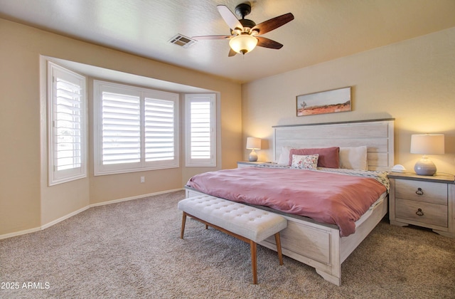 bedroom with baseboards, visible vents, carpet floors, and ceiling fan