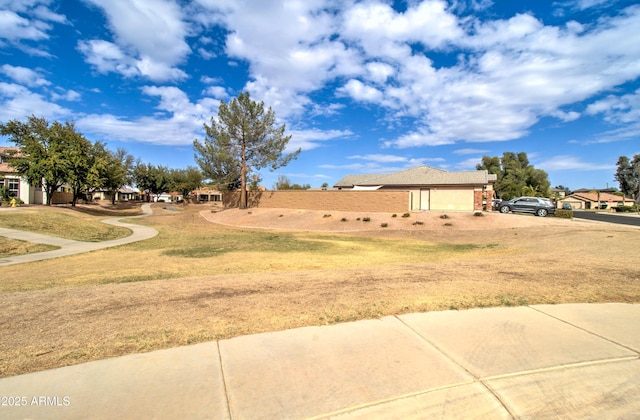 view of yard with an attached garage