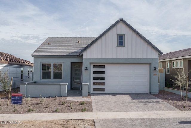 view of front of property featuring a garage