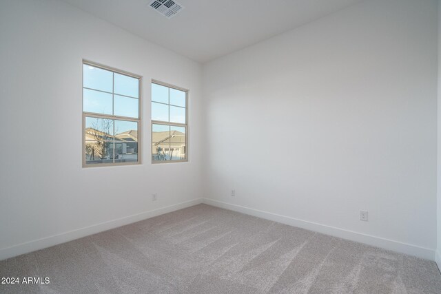 laundry area featuring washer and clothes dryer, cabinets, and dark hardwood / wood-style floors