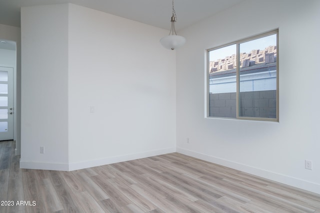 empty room with light wood-type flooring