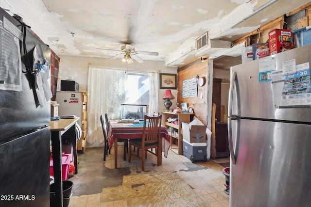 dining room with visible vents and a ceiling fan