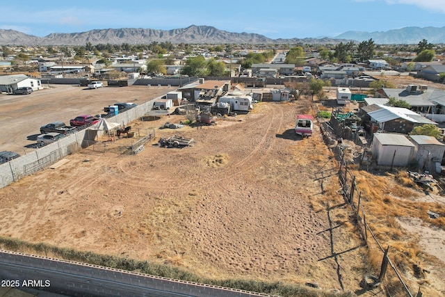 birds eye view of property featuring a residential view and a mountain view