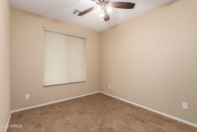 empty room featuring ceiling fan