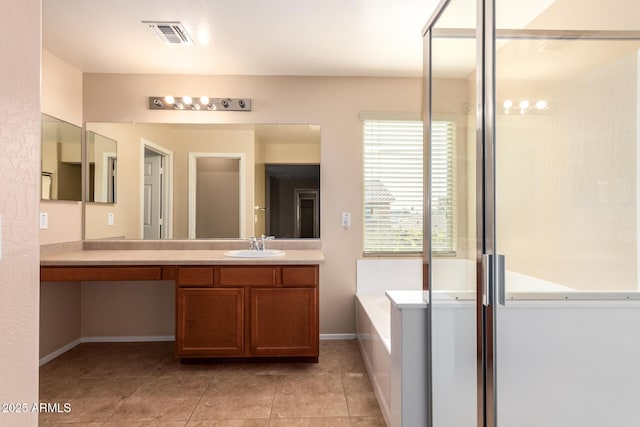 bathroom featuring tile patterned floors, vanity, and independent shower and bath