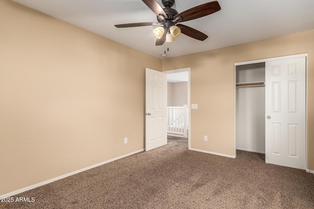 unfurnished bedroom featuring dark carpet, a closet, and ceiling fan