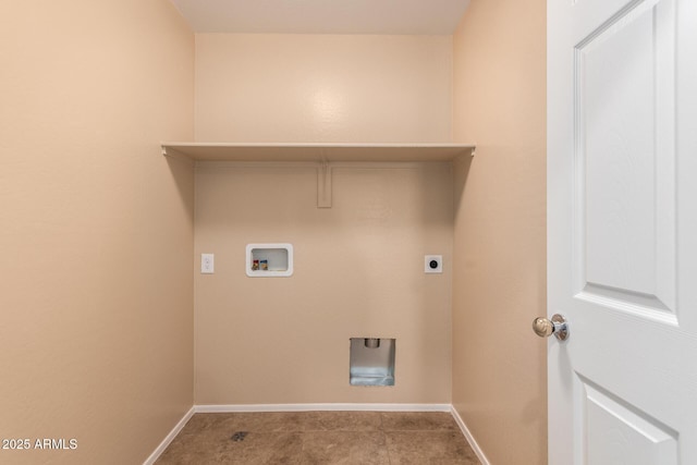 clothes washing area with washer hookup and hookup for an electric dryer