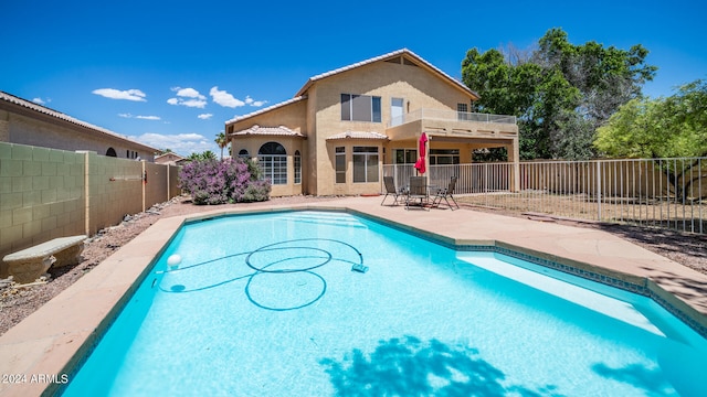 view of pool featuring a patio