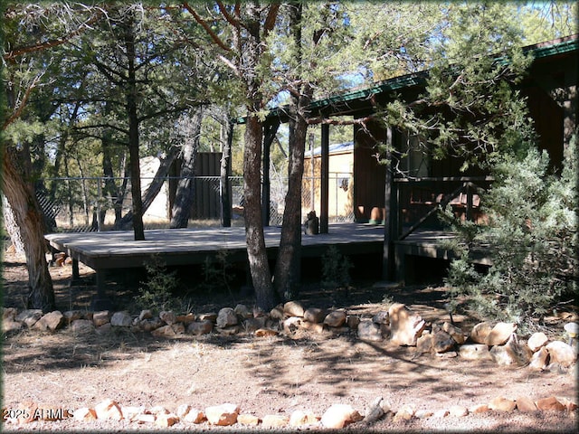 view of property exterior featuring a deck