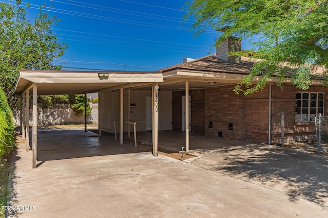 6100 N 36th Ave, Phoenix, AZ 85019 - view of patio / terrace with driveway and an attached carport
