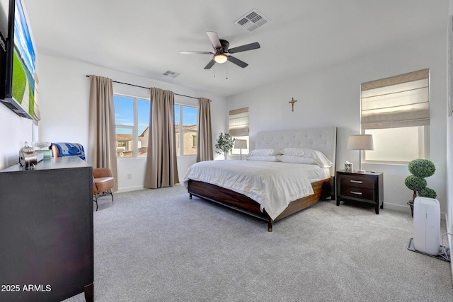 bedroom featuring carpet flooring, baseboards, and visible vents