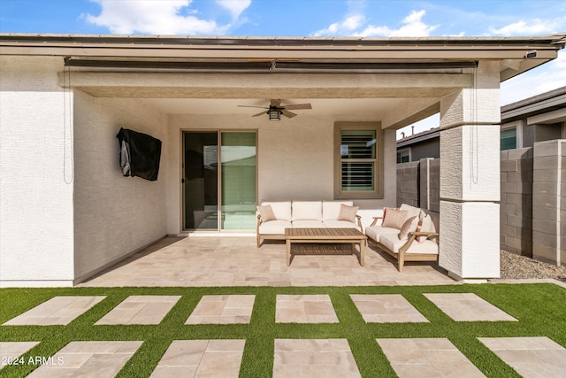 view of patio / terrace with ceiling fan and an outdoor hangout area