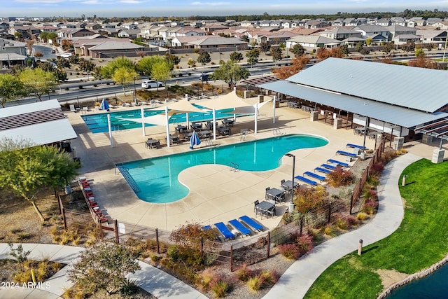 view of pool featuring a patio