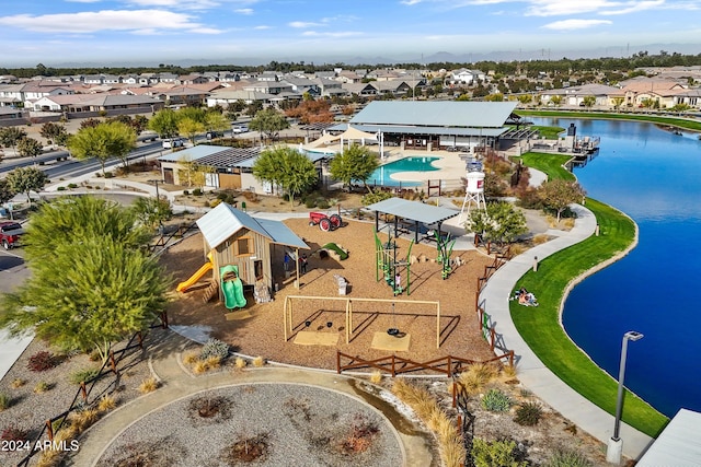 birds eye view of property featuring a water view