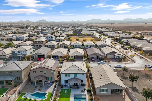 drone / aerial view featuring a mountain view