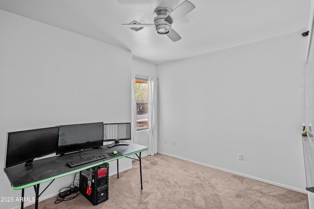 office area featuring ceiling fan and light colored carpet