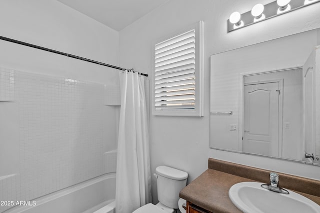 full bathroom with toilet, vanity, and shower / tub combo with curtain