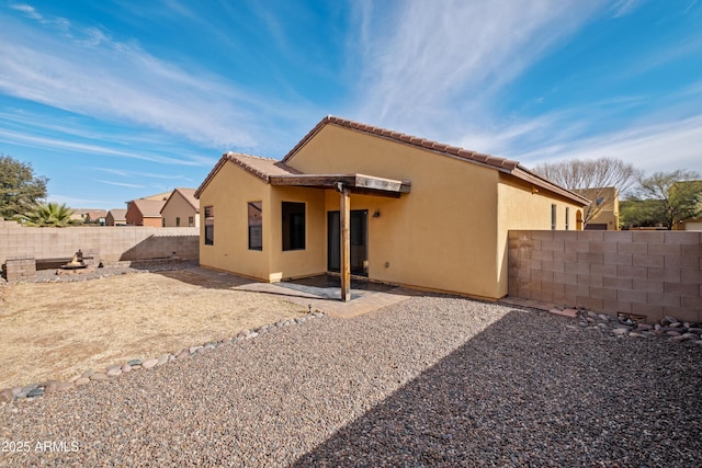 rear view of property with a patio