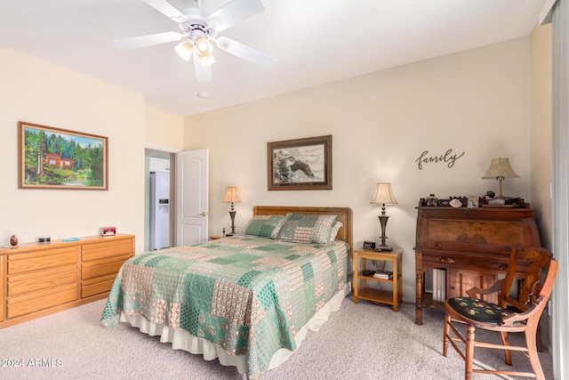 bedroom featuring ceiling fan and light colored carpet