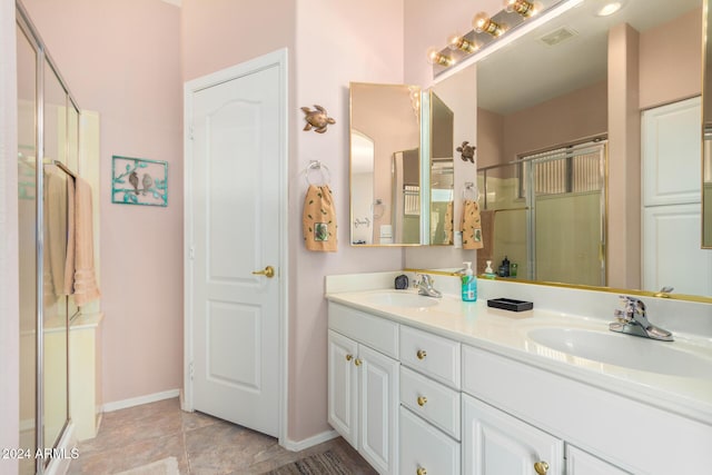 bathroom with vanity and walk in shower