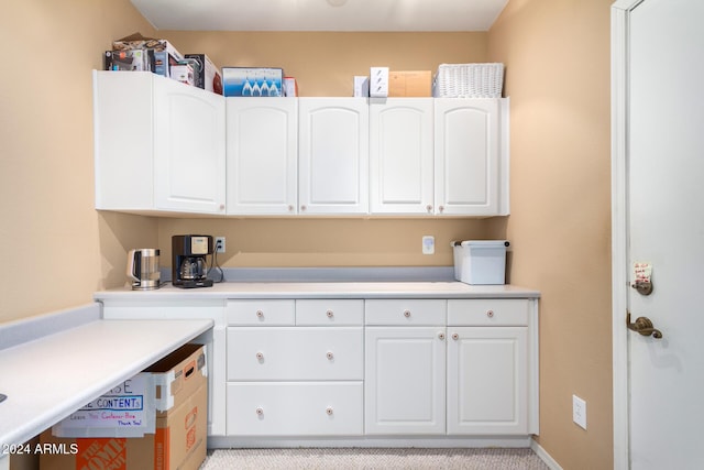 kitchen with white cabinetry