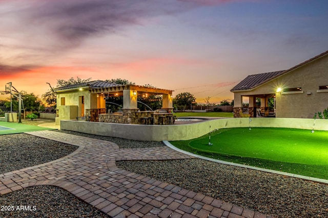 view of swimming pool with a putting area, a gazebo, and a patio area