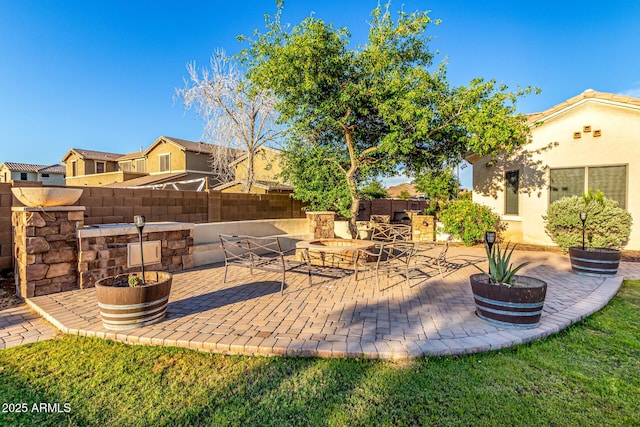 view of patio / terrace featuring fence