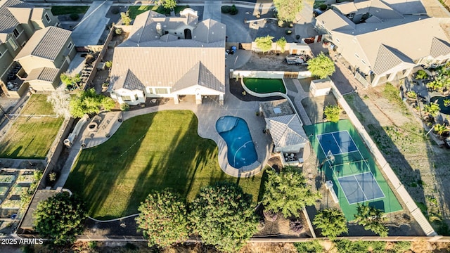 aerial perspective of suburban area with a pool