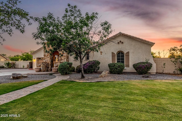 view of front of home featuring stucco siding