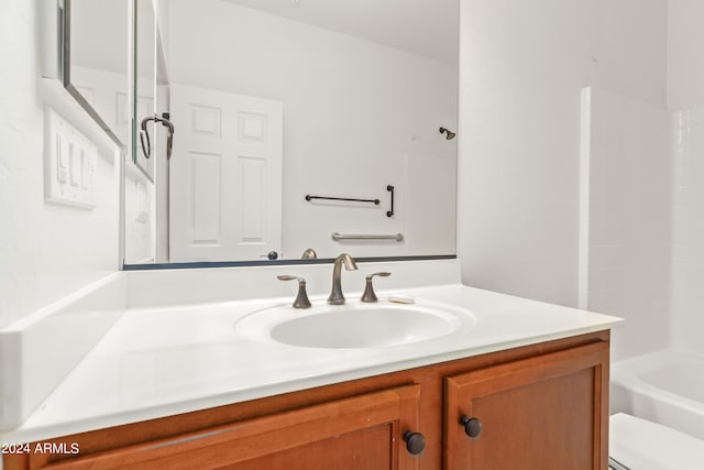 full bathroom featuring vanity, toilet, and bathing tub / shower combination