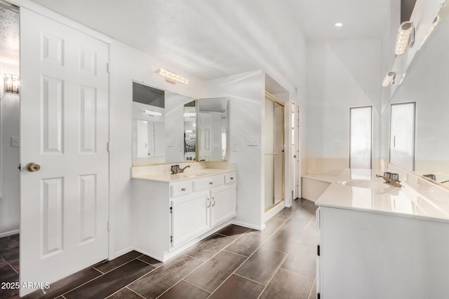 bathroom featuring vanity and walk in shower