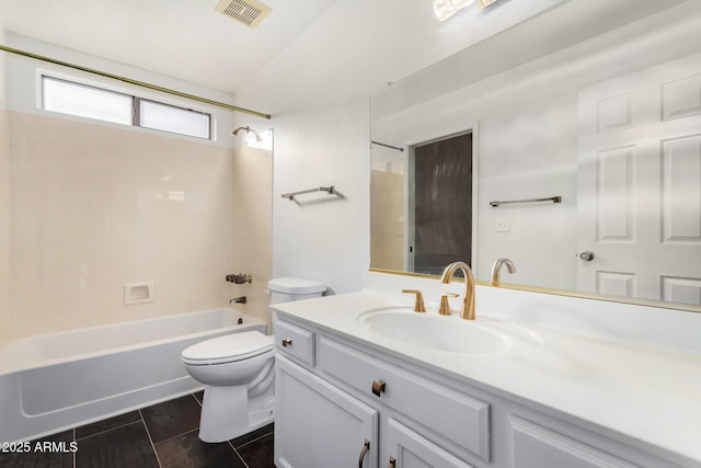 full bathroom with tile patterned flooring, vanity, toilet, and washtub / shower combination