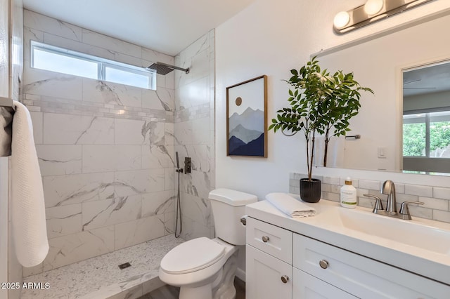 828 E Le Marche Ave, Phoenix, AZ 85022 - full bathroom featuring plenty of natural light, toilet, vanity, and a tile shower
