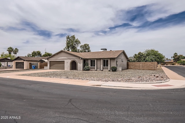 828 E Le Marche Ave, Phoenix, AZ 85022 - ranch-style home with fence, driveway, a garage, and stucco siding