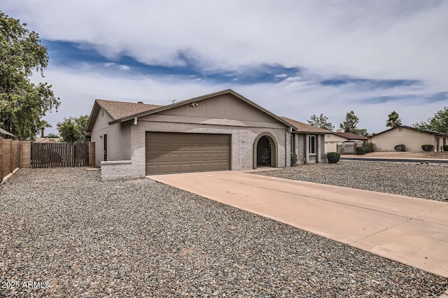 828 E Le Marche Ave, Phoenix, AZ 85022 - view of front of house with fence, a garage, driveway, and a gate
