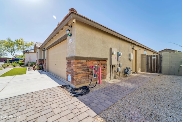 view of home's exterior with a garage