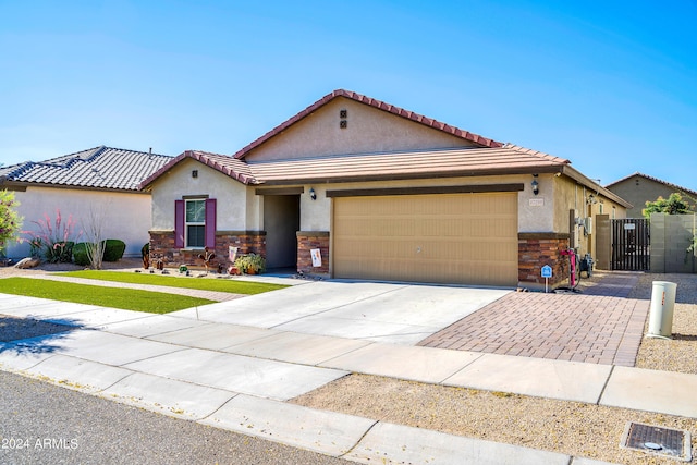 view of front of property featuring a garage