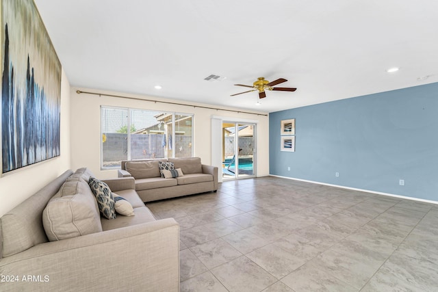 living room with ceiling fan