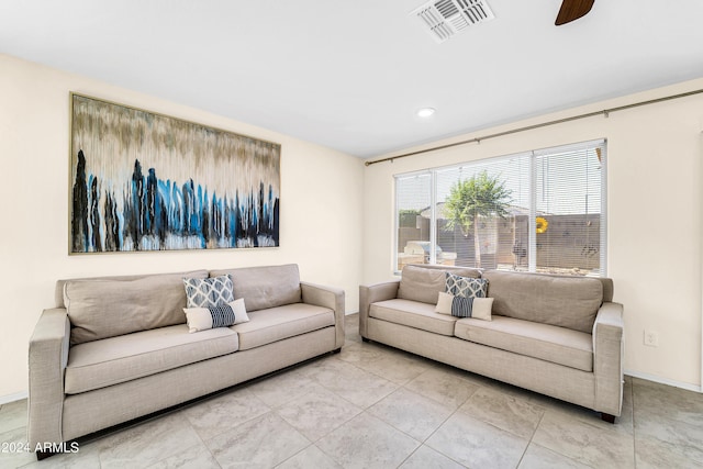 living room with ceiling fan