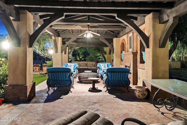 view of patio / terrace featuring a gazebo and an outdoor hangout area