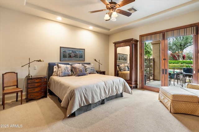 bedroom featuring visible vents, light carpet, access to outside, recessed lighting, and a raised ceiling