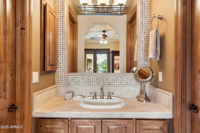 bathroom featuring vanity and ceiling fan