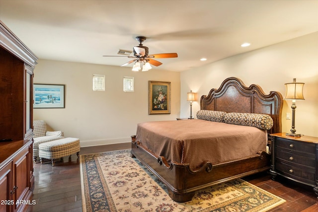 bedroom with visible vents, recessed lighting, dark wood-type flooring, and baseboards