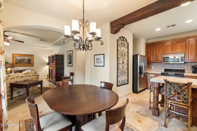 dining area featuring beam ceiling, recessed lighting, ceiling fan with notable chandelier, and visible vents