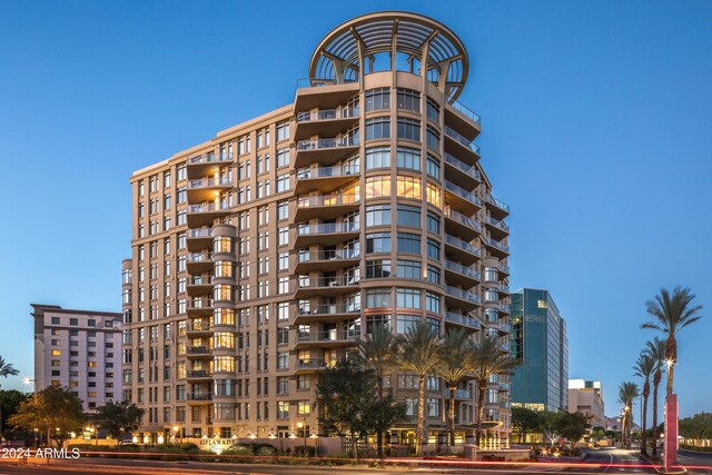 view of building exterior featuring a city view