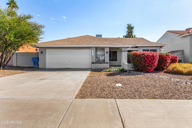 single story home with a garage